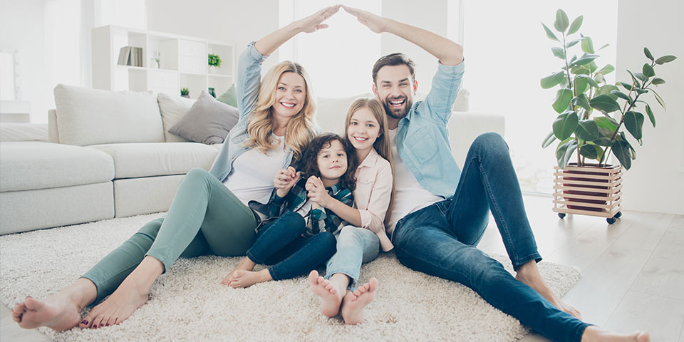 happy family with home insurance