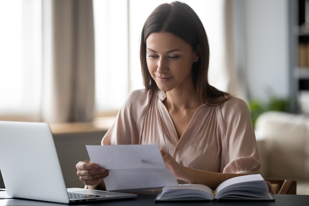 women reviewing insurance quote